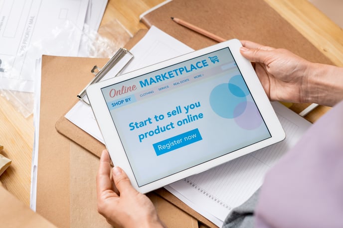 hands-of-contemporary-female-manager-of-online-sho-THCG6H3